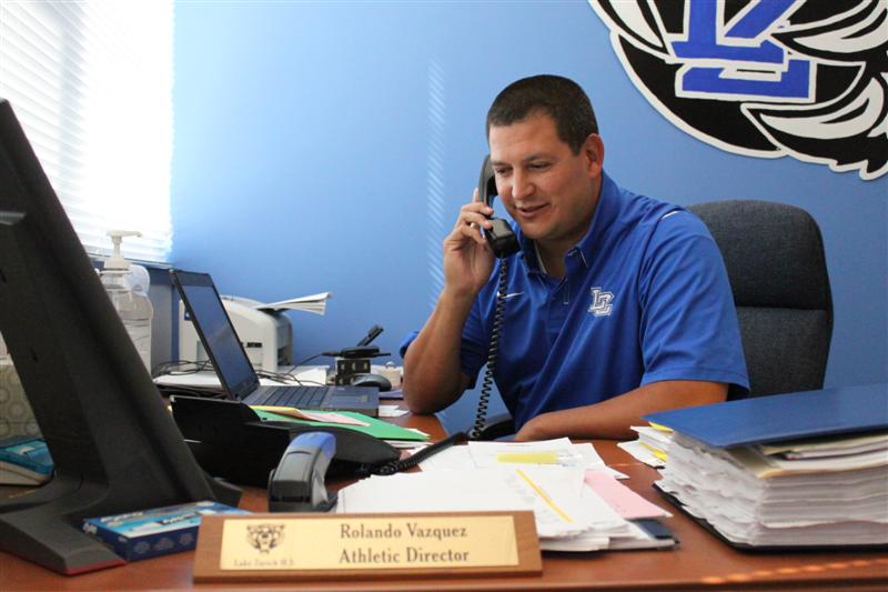 Athletic director sets up for victory