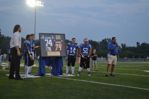 Anthony Castonzo, LZHS graduate and Indianapolis Colts offensive tackle, was presented with his framed LZ Flames and Boston College jerseys. Castonzo was recognized for his outstanding academic and athletic abilities.