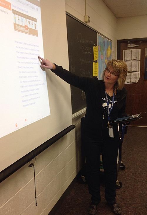 Teachers throughout the school, such as Libby Reimann, social studies teacher, have been integrating iPads into the curriculum. However, problems with Apple TV have caused disruptions in the learning process. 