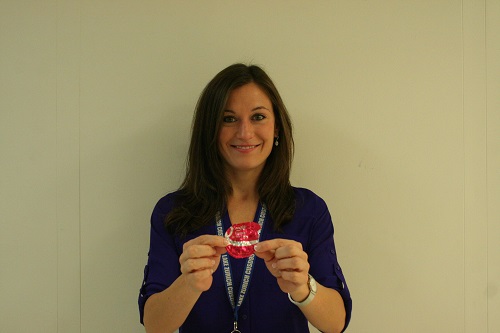 Teacher collecting pink yogurt lids to raise money for cancer research