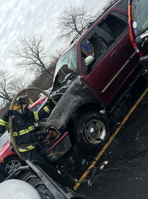 Car catches fire in parking lot, reasons still unknown