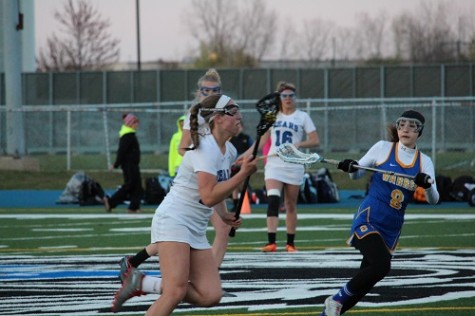 Girls lacrosse storms ahead, beats Warren Blue Devils