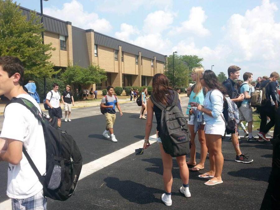 Lake Zurich students wait outside for the all clear to go back into the building.  On Friday, the school will be practicing  all three drills. 