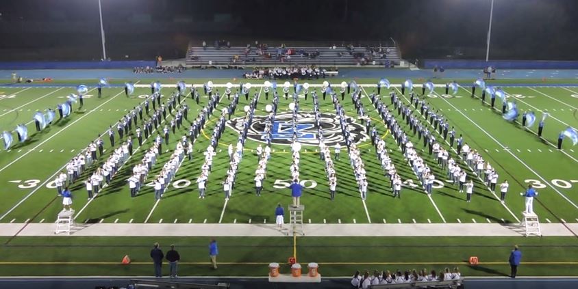 Last Friday, the 7th and 8th graders from the middle schools joined the marching band at halftime. The high school marching band looks for ways to incorporate younger musicians into their program. Photo credits to Michael Leo. 