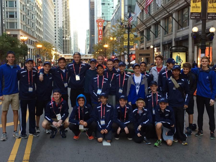 The+boys+cross+country+team+volunteered+at+the+Chicago+Marathon+on+October+11.+Both+girls+and+boys+cross+country+teams+had+the+opportunity+to+help+out+in+a+water+station+during+the+race.+