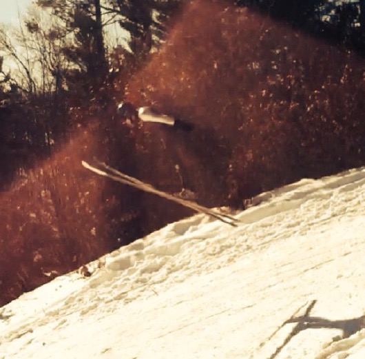 DJ Young reaches for the stars. DJ Young, sophmore ski jumper, sails high above the rest in this adreninline pumping winter sport.