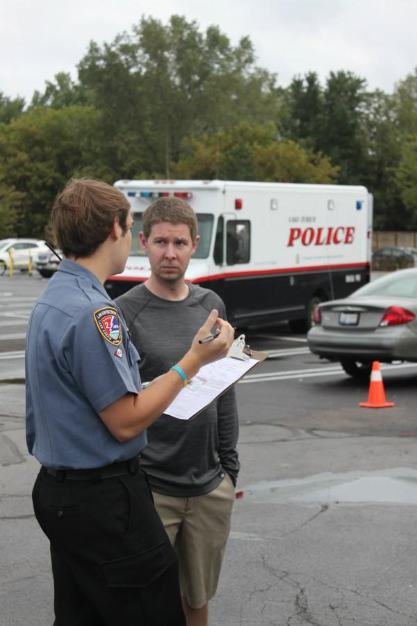 The Police Explorer post helped people set up car seats for a community service project. While learning about careers in law enforcement, the explorers often do things to help the community.