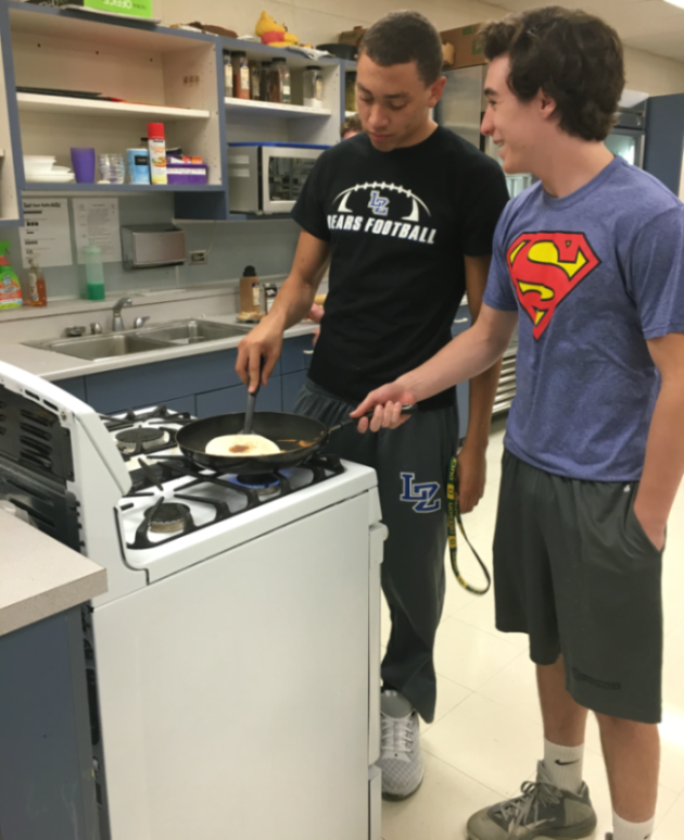 Two seniors from kitchen six, Dante Manley (left) and Jerry Brown (right), are preparing for their week of “Restaurant Week.”  Each of the kitchens in Mrs.Baker’s fifth period Culinary Arts class has their own week to prepare their foods of their choice that they will serve to teachers on Friday.