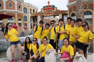 Alex Li, who has been teaching for Fenghua Academy for two years, is pictured with his volunteer group, who taught English to people in China.