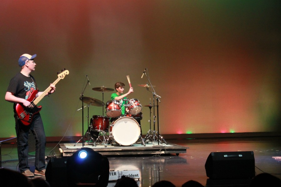 Anthony Powles, junior, plays at Battle of the Bands 2016 with the Jimmy Carter Rabbit Incident. He has been playing for four years, starting on buckets and moving to the drums.