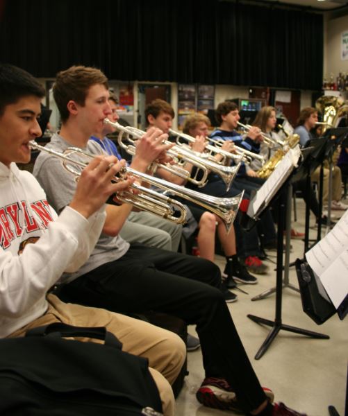 Caleb Harada and Nick Thurston, seniors practice the song Nimbus Capulus for the Hersey Invitational on Saturday, April 16. The Wind Ensemble will be performing and listening to other bands as well as getting feedback from collegiate  judges.  