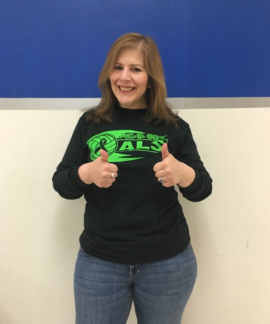 Karen Marchand, English teacher is one of the many teachers and students that purchased a shirt in order to support the Amos family and the boys volleyball team.  The team is devoting the game to fundraise for amytrophic lateral sclerosis (ALS) to honor a players mom who passed away this March. 