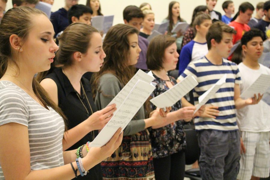 Choir students practice for their final bows of the year. They work on choreography and polishing the vocals as the concert date quickly approaches.