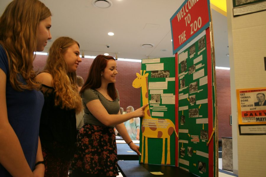 Caroline Niepsuj explains her History Fair project to her peers.  Chicago Studies is hoping for a good outcome this morning for their first time recreating this historical event.