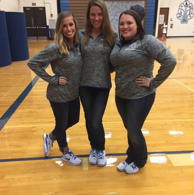 Michelle Cevaal (far left) and Rachael Fischer (far right) are the two new Family and Consumer Science teachers (FACS). Along with the teaching, Cevaal and Fischer also coach cheer leading.