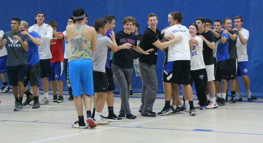 The senior boys practice their dance.