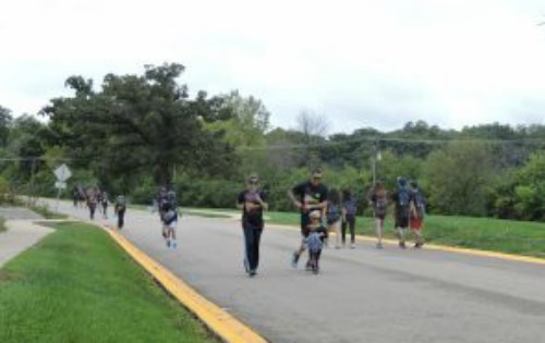 Runners making their way back to the PAC parking lot after making it to their halfway point at May Whitney.