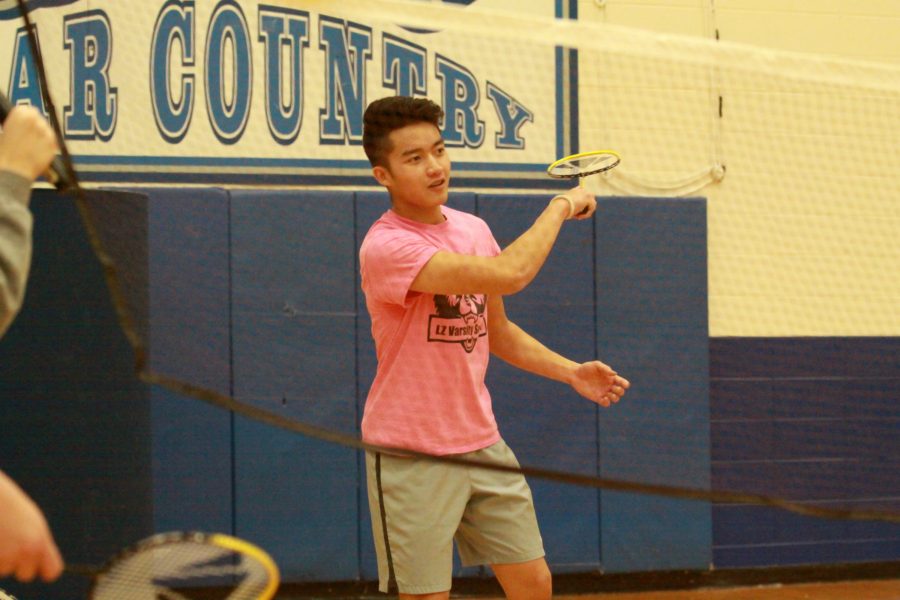 Alvin Pham, senior, clears the birdie late in the championship game.