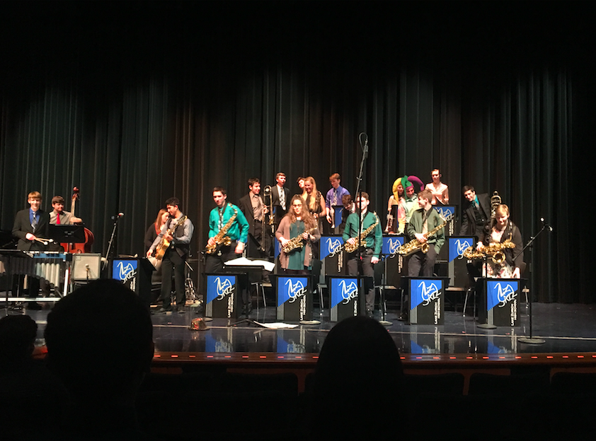 The Honors Jazz Ensemble stands after their performance at their concert, Jazz In Session! 