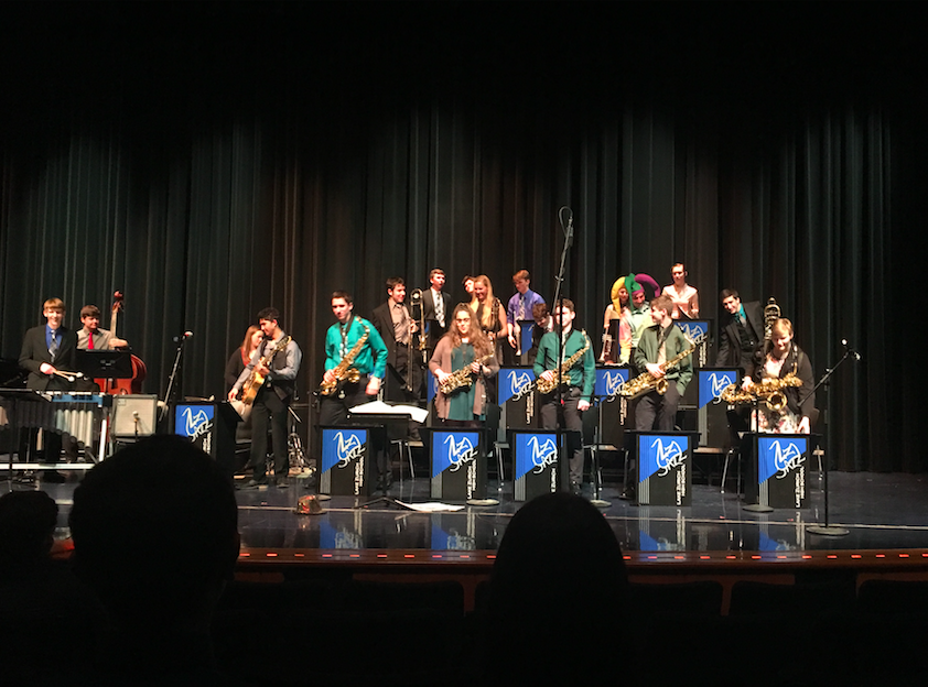 The+Honors+Jazz+Ensemble+stands+after+their+performance+at+their+concert%2C+Jazz+In+Session%21+