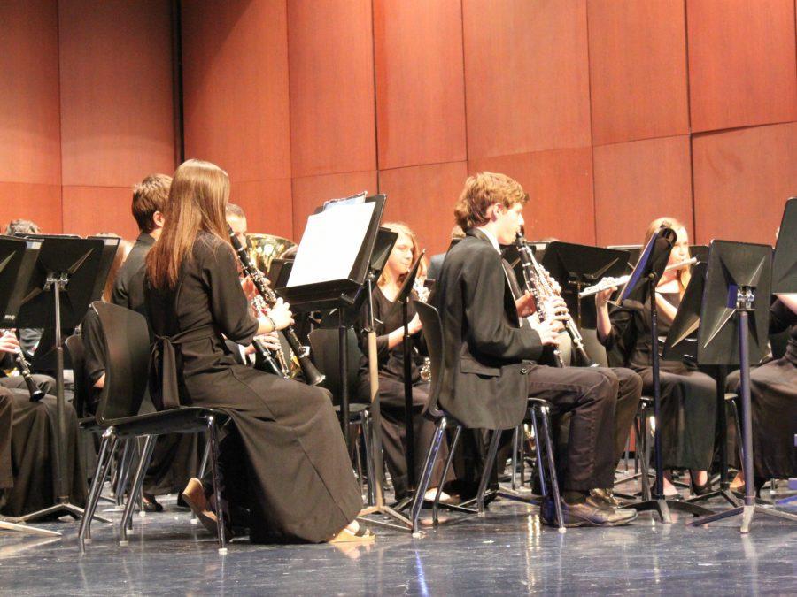 Band members perform at their concert on March 9 to show their improvement and hard work.