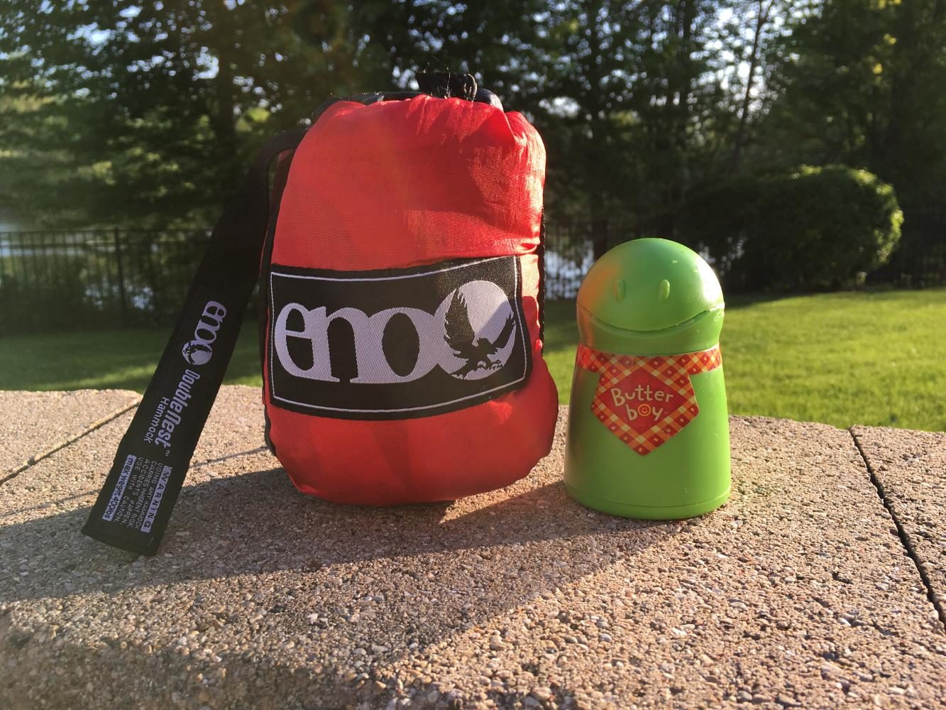 The ENO Hammock and Butter Boy are two simple ways to make a more relaxing summer. The ENO hammock costs approximately $100, and the Butter Boy is $8