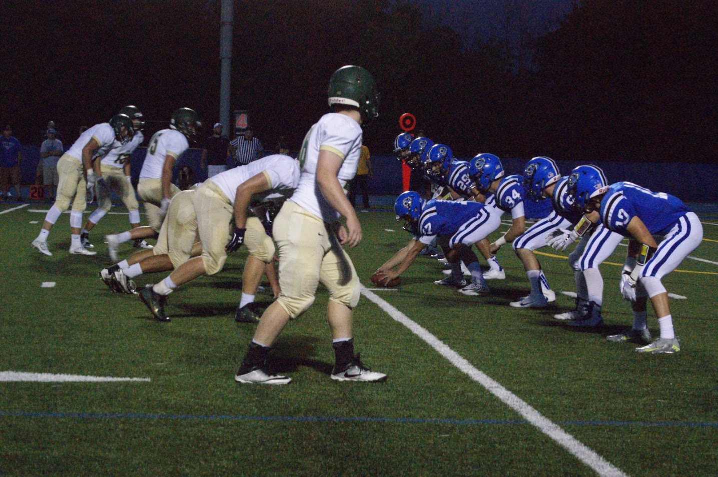 Football players line up for the next play during a game on August 26, prior to the hazing allegations. New head coach Luke Mertens is bringing a brand new coaching philosophy which he believes will bounce the program back.