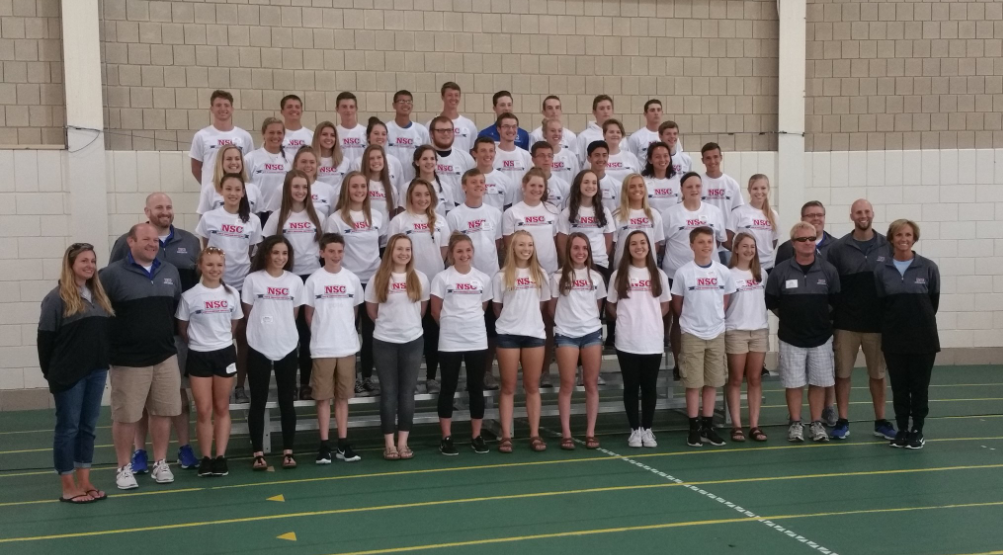 Andrew Lambert, athletic director, with student athletes at the NSC Leadership Conference.