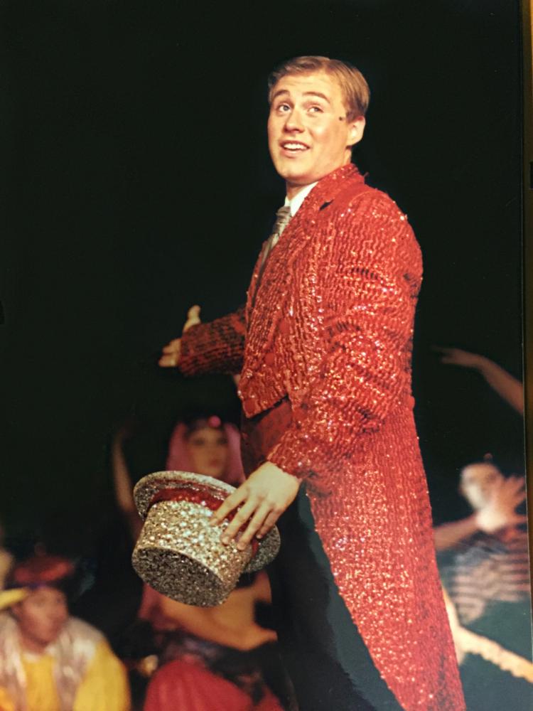 Billy Misik, 2003 graduate, performs in the musical, Chicago. After being diagnosed with brain cancer his senior year, Billy still went on and performed the lead as Billy Flynn.