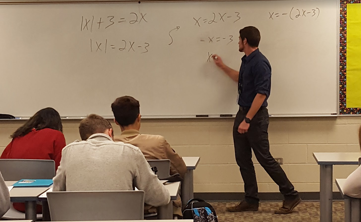 Perkins+teaches+his+8th+period+math+class+pre-calculus.+Along+with+pre-calc%2C+Perkins+is+a+new+teacher+at+LZHS+who+will+also+be+tackling+Algebra+1++and+2+for+his+course+load.