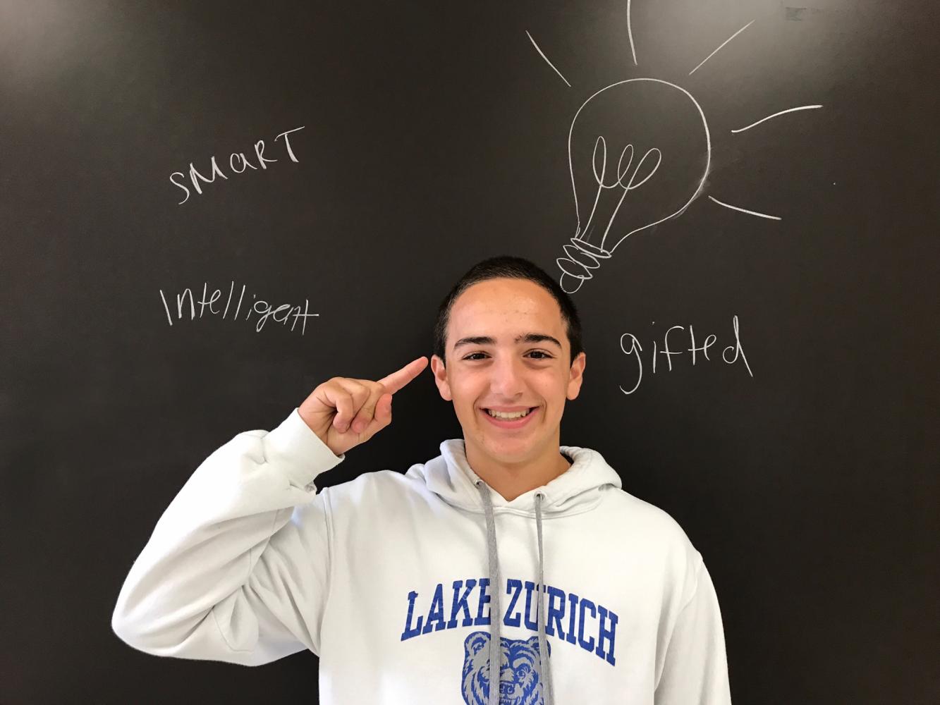 Landon Finn, junior, surrounds himself with many of the labels gifted program students often have thrust upon them.