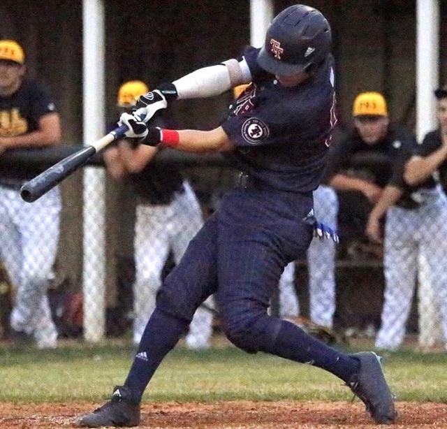 Tyler Snep playing baseball in a game with his travel team, Top Tier.  Snep committed to Iowa through Top Tier.