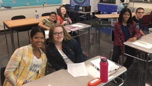 The life skills class poses during their dog treat project. Members of the class said they enjoyed baking the snacks.