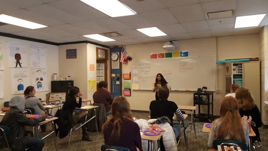 Neha Praseed presents one of her pieces at one of last years showcases for the speech and acting team. The club puts on several showcases a year as part of their preparation for their competitions.
