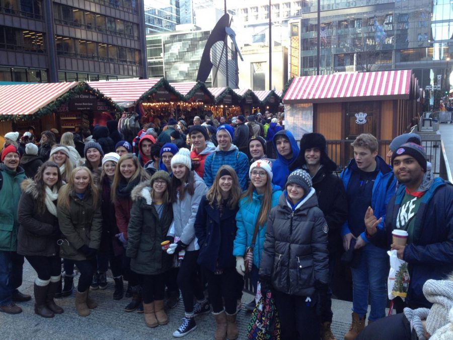 German IV students pose in front of the German market during their Saturday field trip. The trip showed German Christmastime traditions to Lake Zurich students. 