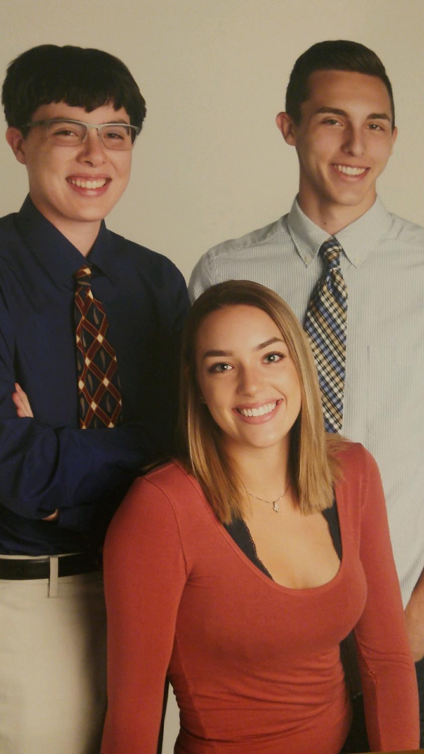 Kyle Grenier (left), Olivia Grenier (middle), and Steven Grenier (right), are senior triplets. While they are siblings, these three students could not be more different.