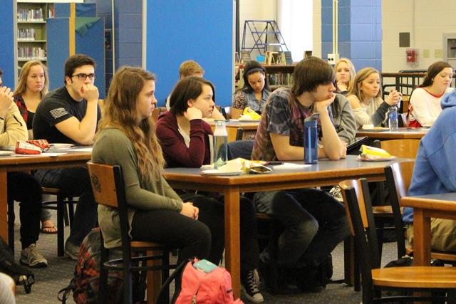 Students listening to one of the Pi Day presenters 