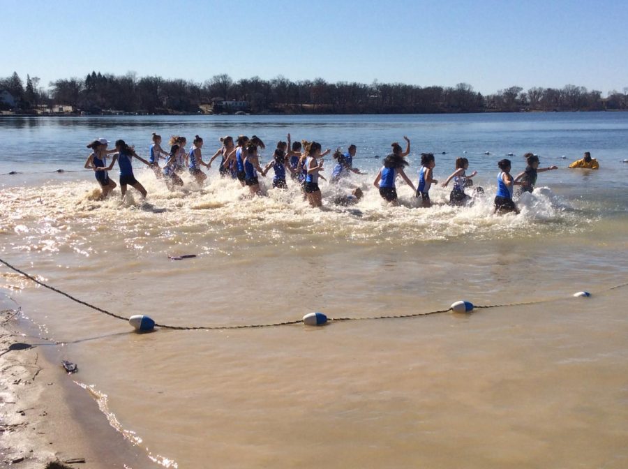 The girls track and field team participated in the Polar Plunge, among other teams, community groups, and families. The event raised money for families affected by cancer.