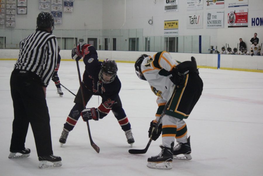 JV captain Jason Saab faces off in a game against Stevenson. JV is just one example of the LZMW hockey club’s improvement over the past few years. 