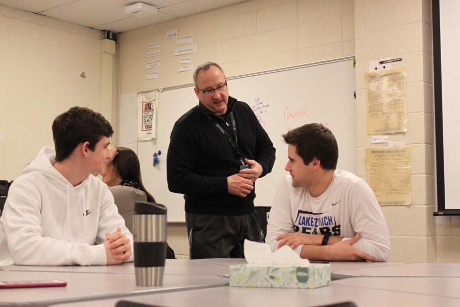 Terry Geoghegan, summer school government teacher, teaches both during the year and over the summer break. Students may choose to take classes over the summer to replace a poor grade during the previous year, or to get ahead on the coursework for the next year, according to Steve Jeretina, summer school principal. 