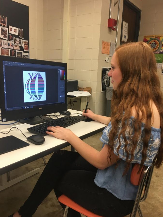 McKenna works at her computer in photoshop. She loads the pictures she takes into photoshop and then edits them to create her pieces.