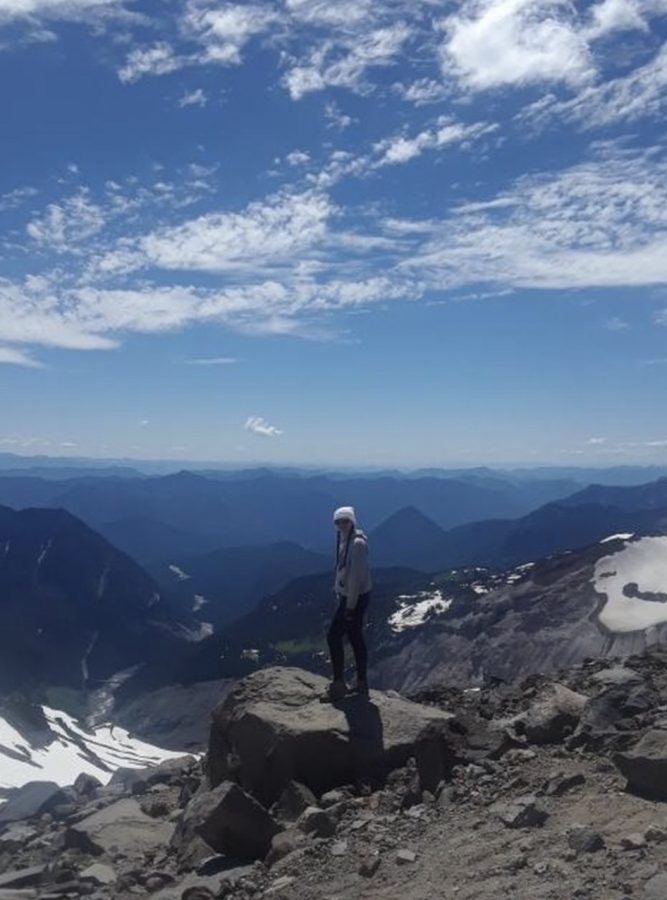 Kaia Rytel, sophomore, poses on Mt. Rainier in Washington. Rytel believes vacations like these really open her eyes to how large the world actually is.