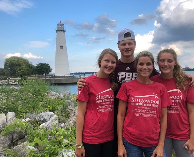 The Piggott family stands for a picture in front of the view. This summer the family spent their time in Detroit while on a mission trip to volunteer.