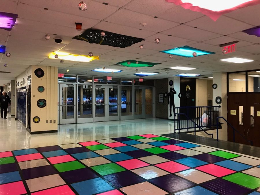 NHS’s disco decorations are by the library entrance. The bright, checkered floor was hard to miss. 