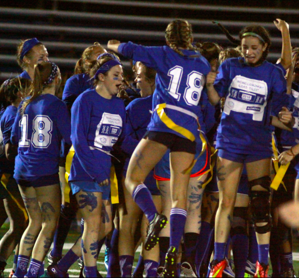 Previous players celebrate a victory in the 2016 junior powderpuff game. Rowell hopes to draw even more spectators to this years games, and encourages all grade levels to come on out and see who will take home the victory.