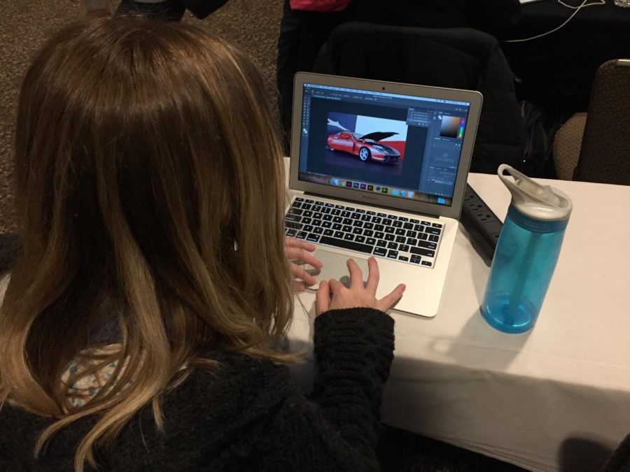 One girl learns to use photoshop and other programs in a computer design course. Girls are showing more interest in STEM fields as a result of classes like the girl’s engineering day.