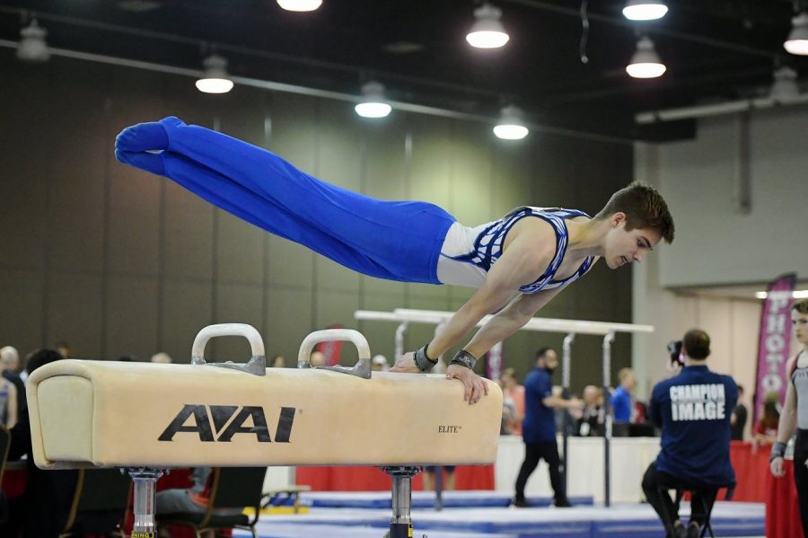 Cooper+Giles%2C+senior%2C+performs+his+pommel+horse+routine+at+the+national+2018+Mens+Junior+Olympics.+Giles+considers+gymnastics+the+biggest+and+most+worthwhile+commitment+in+his+life.