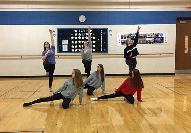 Members of orchesis practice their routine for Winter, Fire, Snow. According to Cora Meagher, junior orchesis member, the team has been working hard on this piece in order to showcase it at the choir concert on Wednesday.