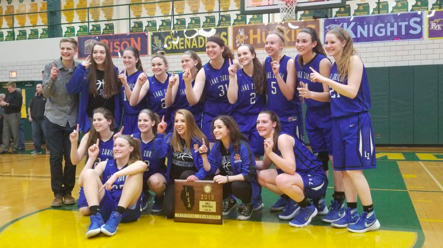 Last years (17-18) girls varsity basketball team celebrates a playoff win and a trip to the Elite Eight. With five new freshman this year, the team hopes to be as successful.