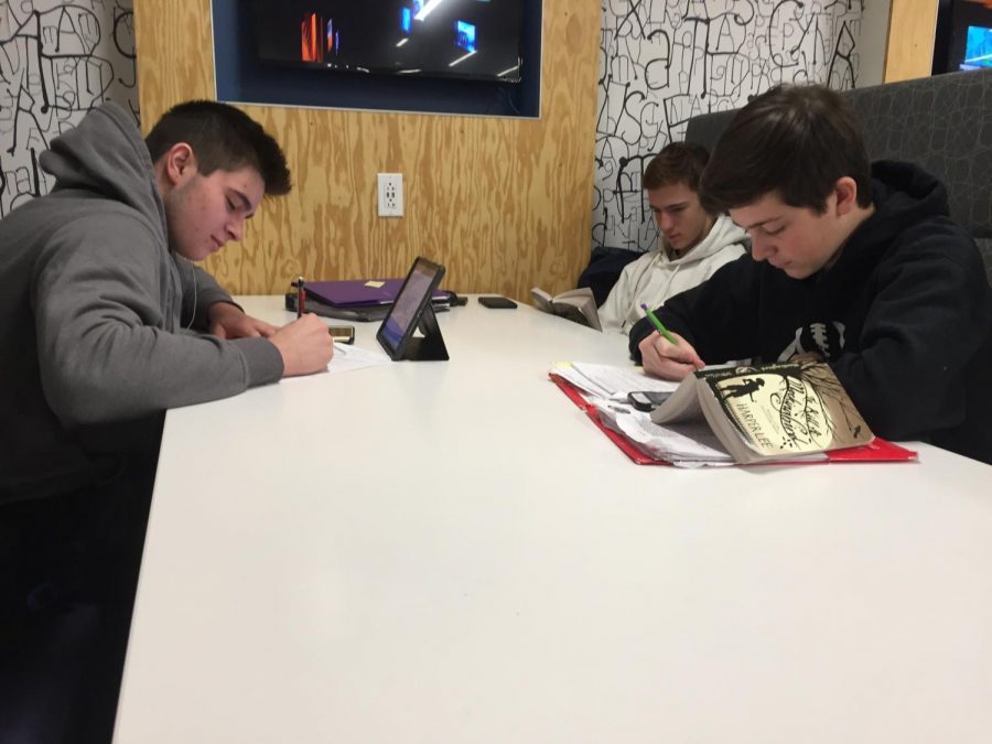 Students sit in Studio C studying for their classes. If final exams were this week, they wouldnt have to continue their studying over winter break